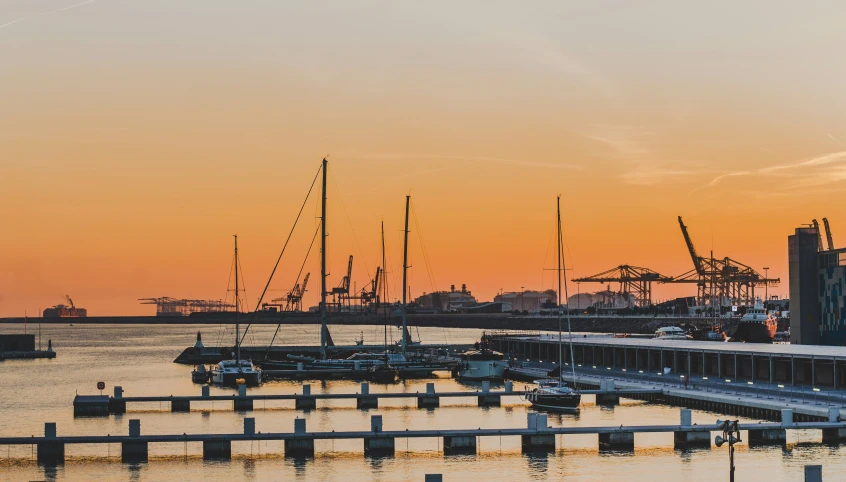 sunset in an urban setting with a dock