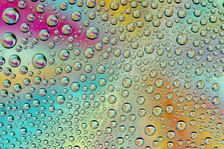 a variety of bubbles are seen on the glass