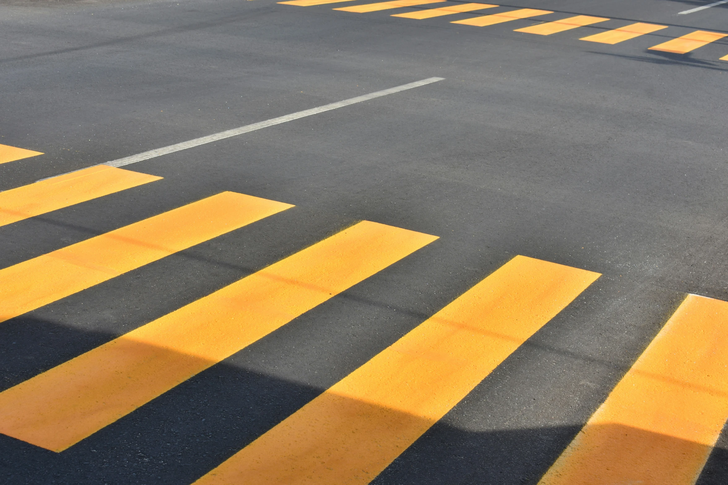 the empty street is yellow and black painted