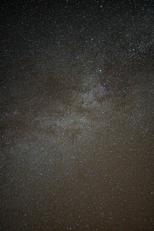 the dark sky is filled with lots of stars