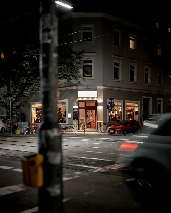 a parking lot on a city street at night