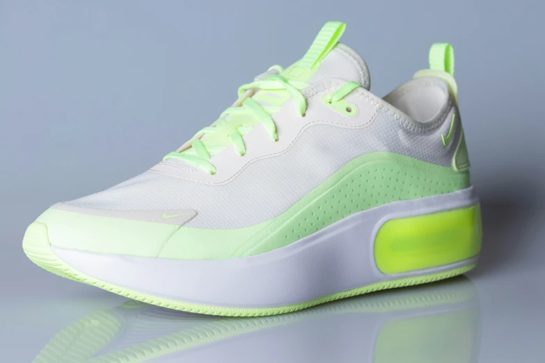 the nike air max sneakers have neon yellow and white shoes