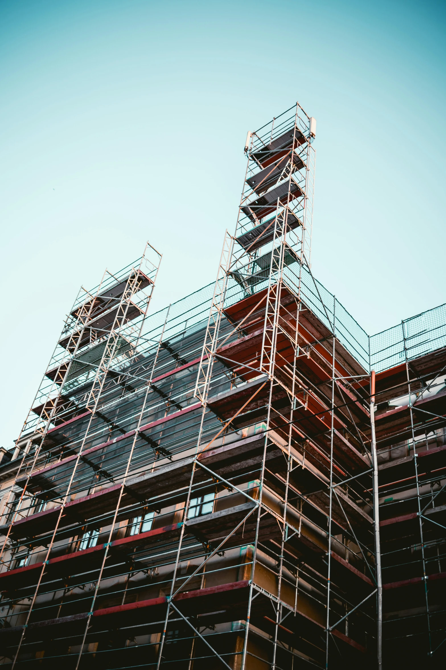 an image of a building being constructed on scaffolding