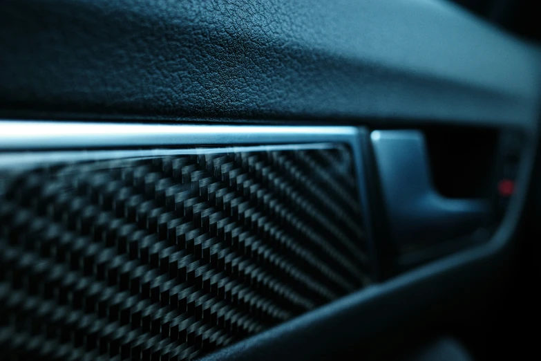 a close up of a black and white car radio