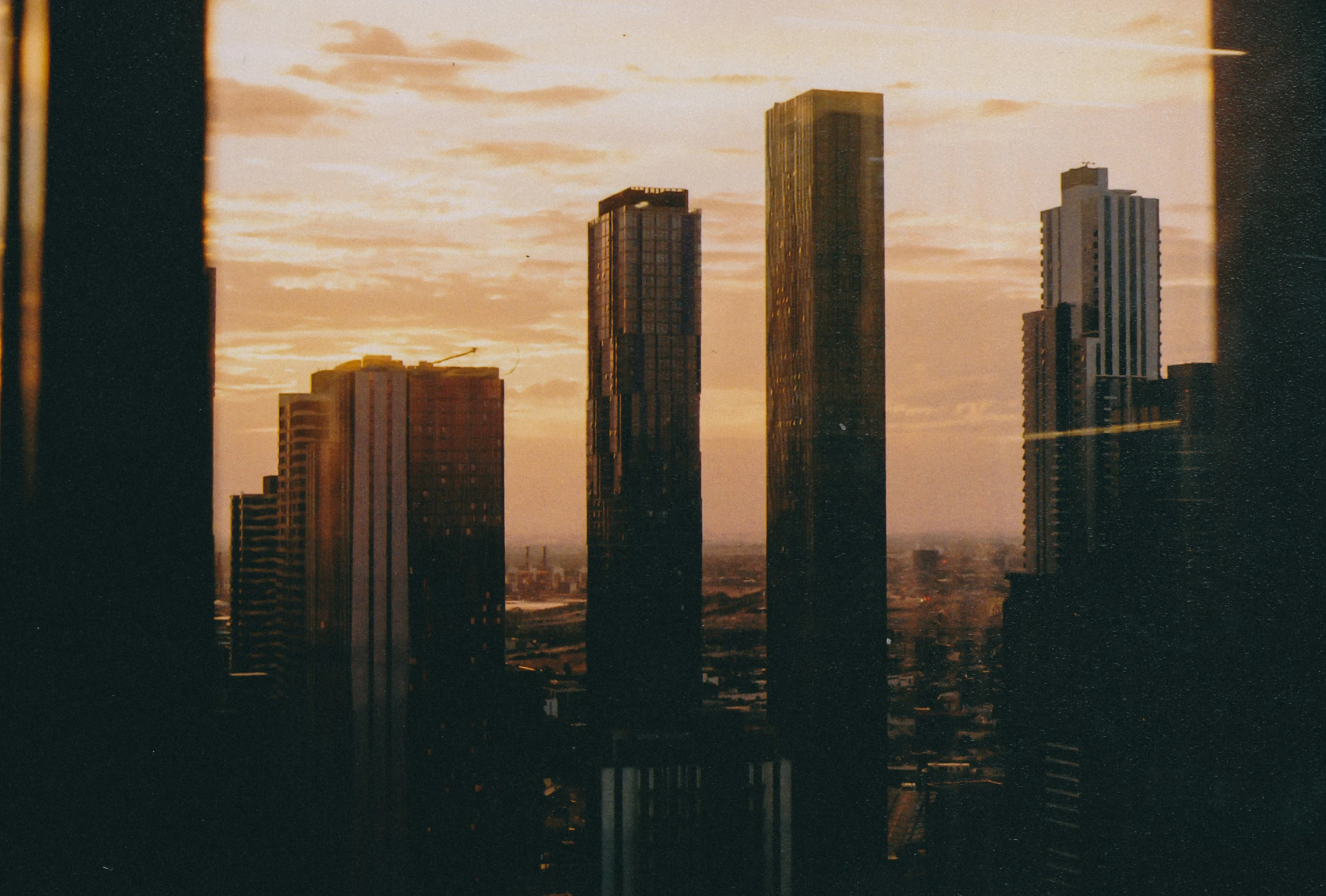 city buildings and skyscrs with a sky background