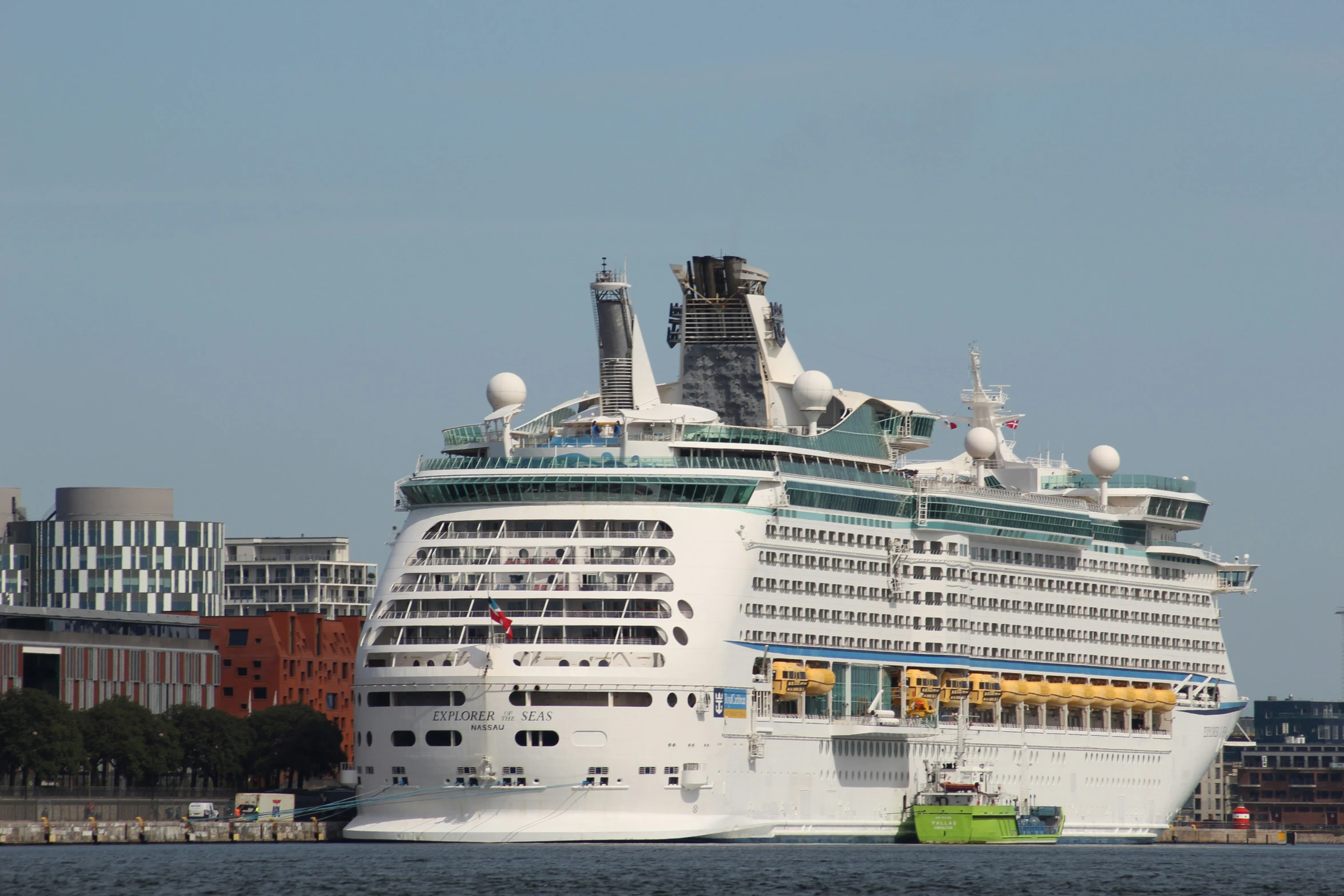 a cruise ship is docked in the ocean