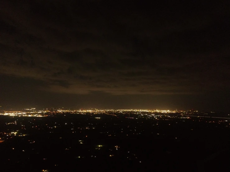 the night skyline from a plane window