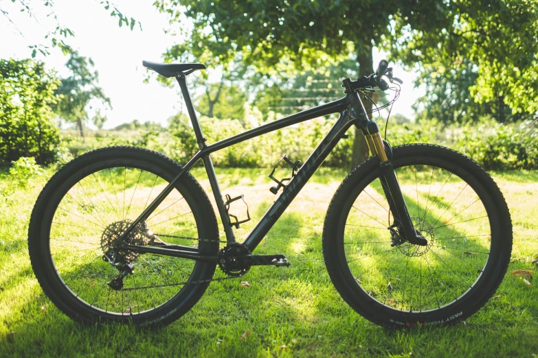 a bike that is sitting in the grass