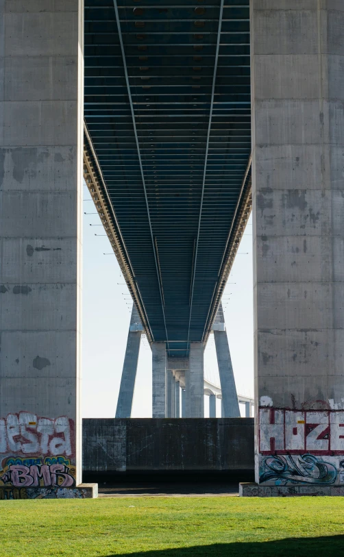 the top half of the bridge is covered by graffiti