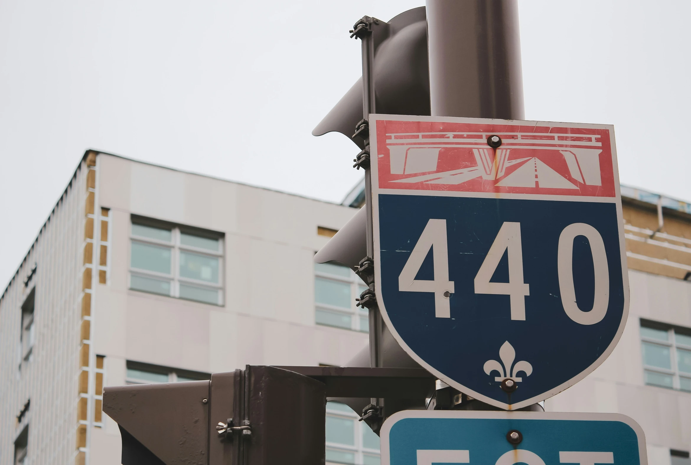 a stop sign at the corner of e - forty, forty, forty and forty