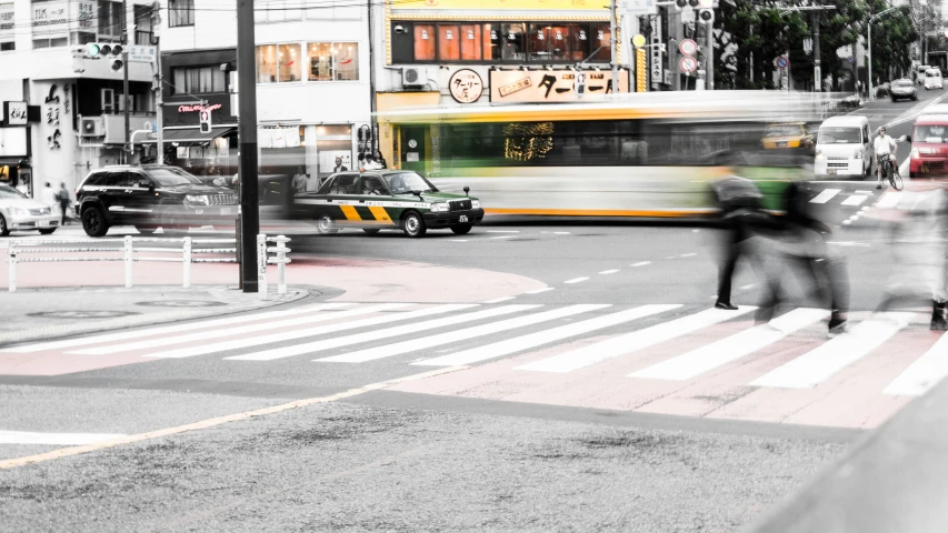 a bus drives down a street with a person