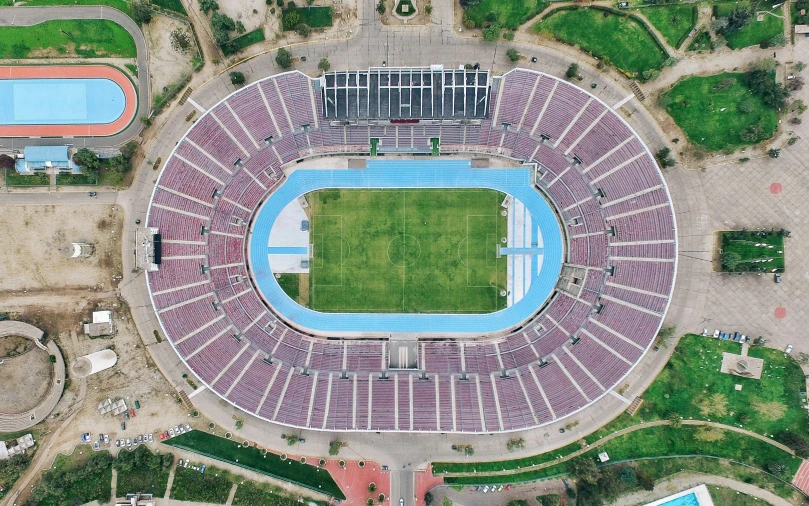 an aerial view of a sports field at an empty stadium