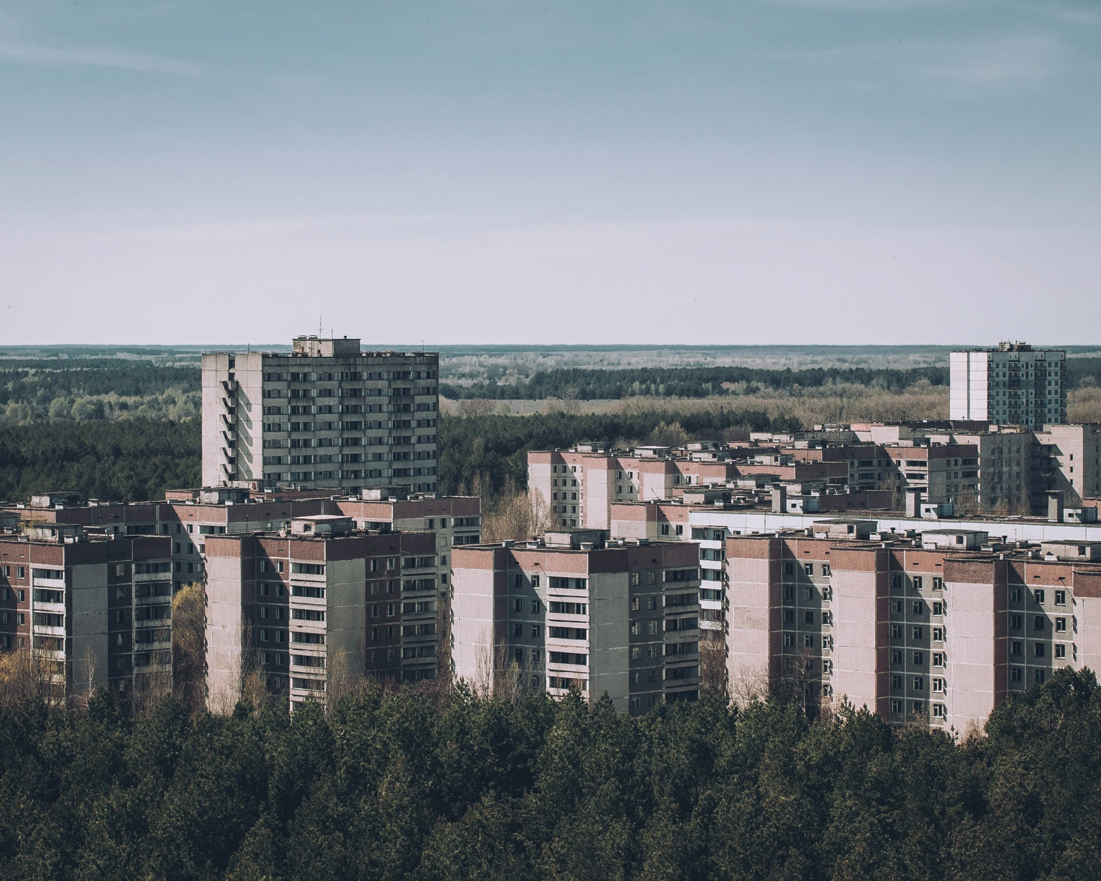 a large city with very tall buildings and trees