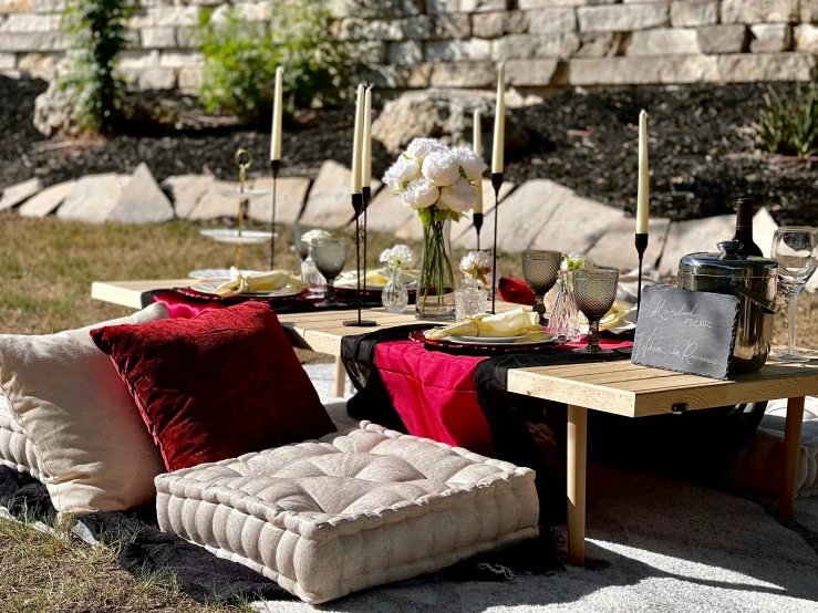 a patio table with an old sofa and table set up