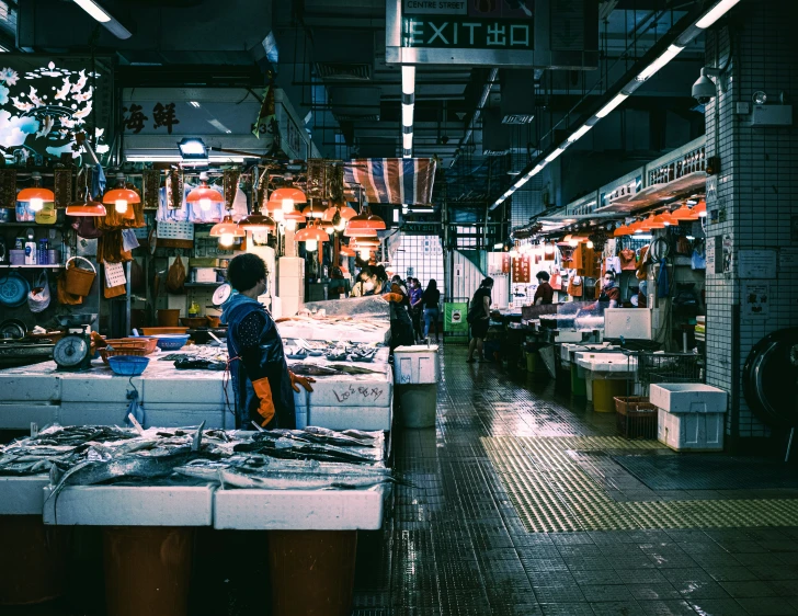 an indoor market with lots of different items in it