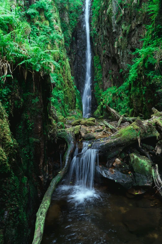 an image of water cascading over a bridge