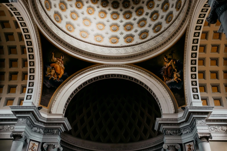 an inside view of a building with a beautiful vaulted ceiling