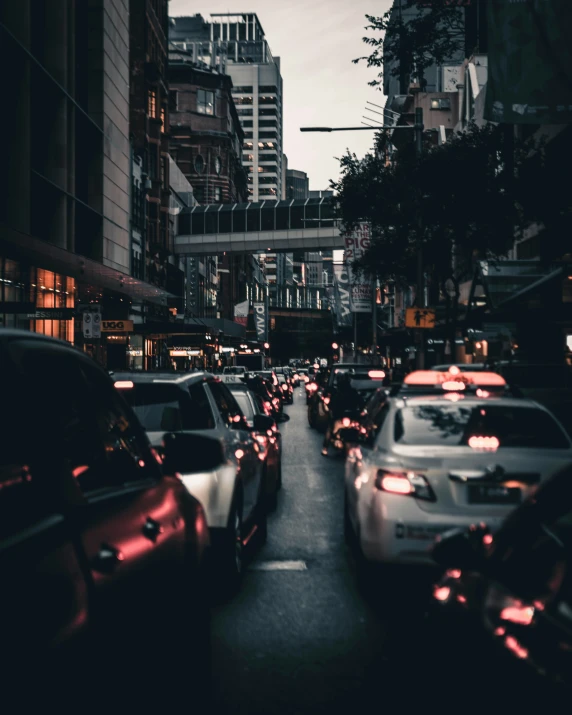 a group of vehicles that are driving down the road