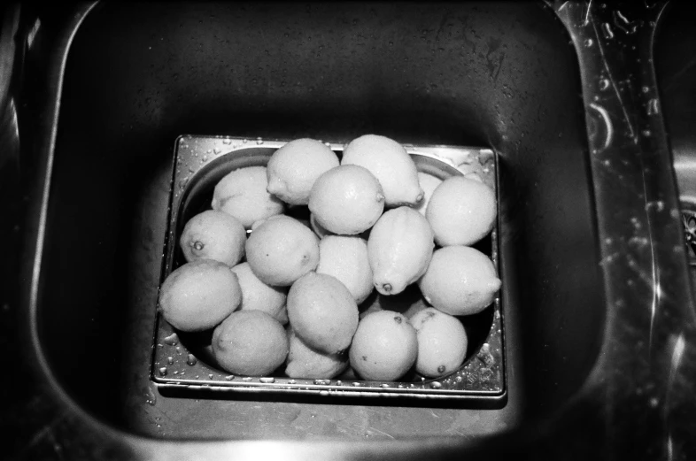 the small bowl is full of water and balls