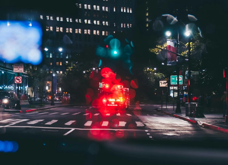 some stop lights that are on a city street