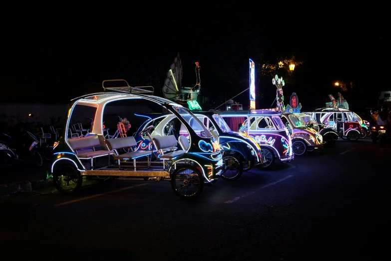 cars lined up in the street at night