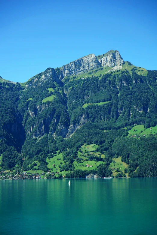 a view of some mountains over a water