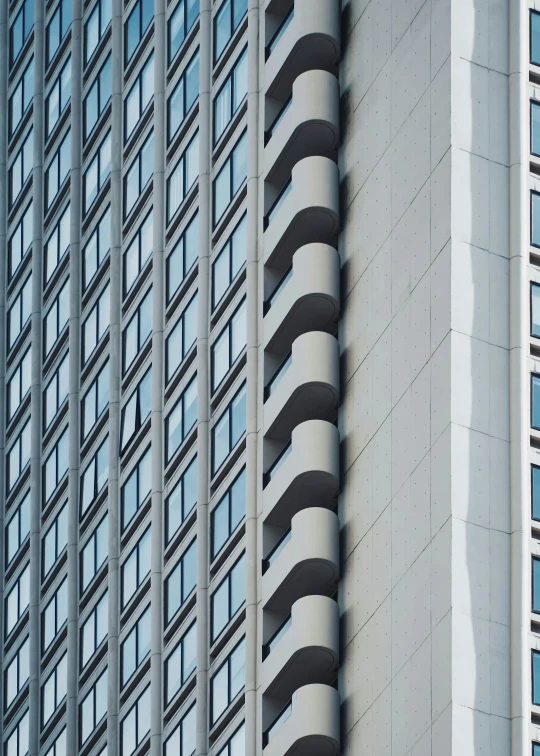 a view of some very tall buildings side by side