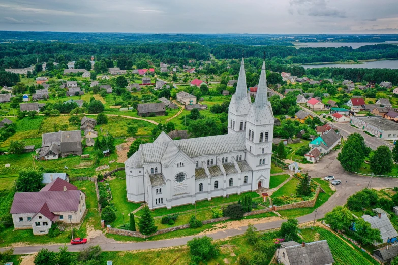 aerial view of a white church in the country