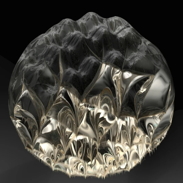 a glass bowl in the middle of a dark table