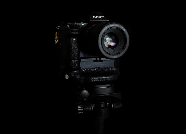 a po camera on a tripod in the dark