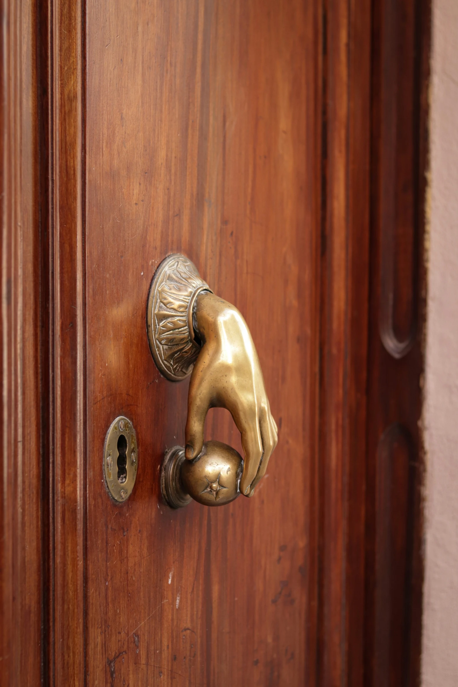 a close up of a metal door 