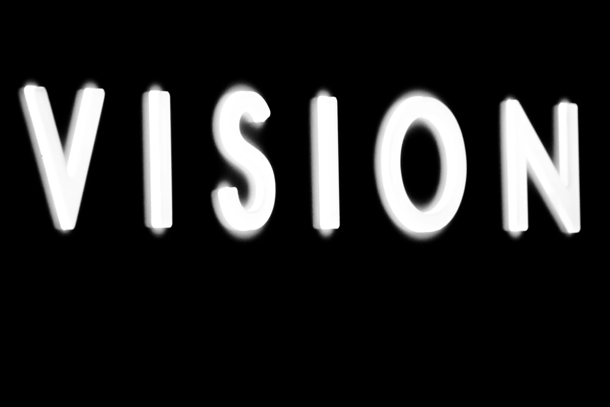 the word vision spelled by the white letters on a black background