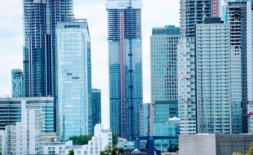 a city with some very tall buildings near one another