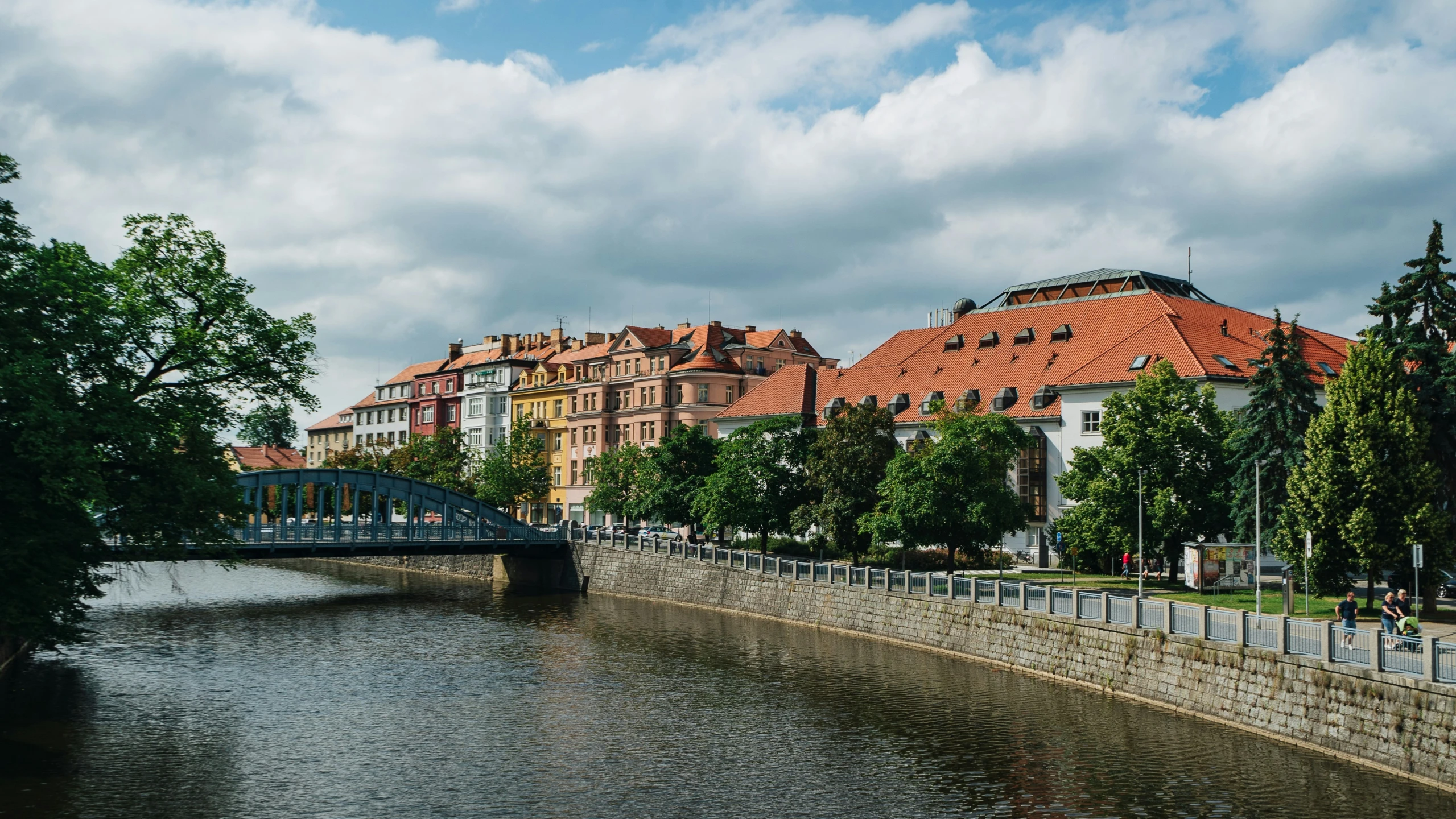 the city is seen from across a river