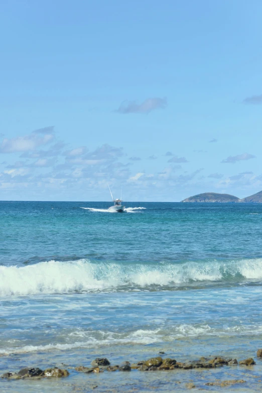 a motor boat traveling on a body of water