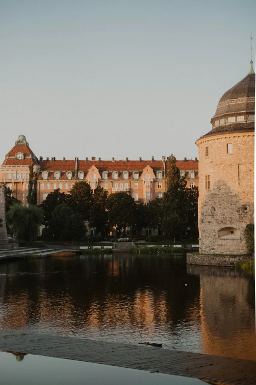 there is a tower and some buildings in the background