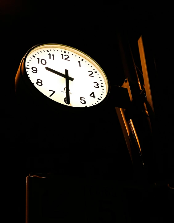 a very tall clock in the night sky