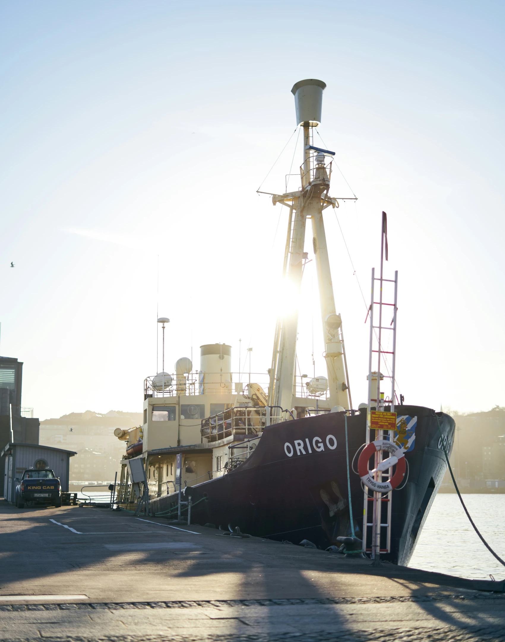 a ship being installed at the pier in a bay