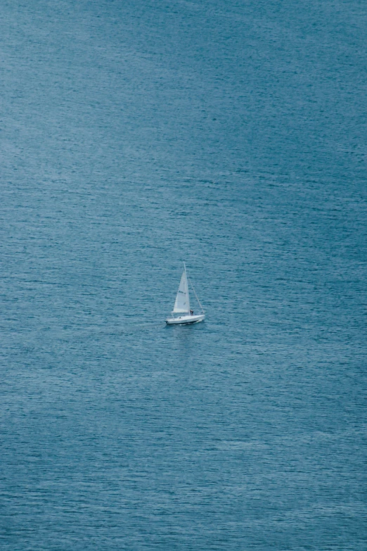 a sailboat sailing in the open water