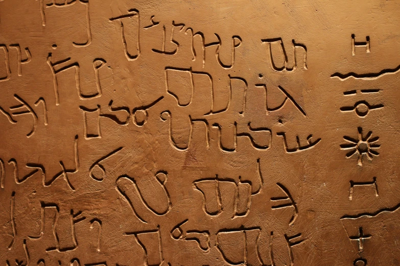 several writing is shown in an ancient style