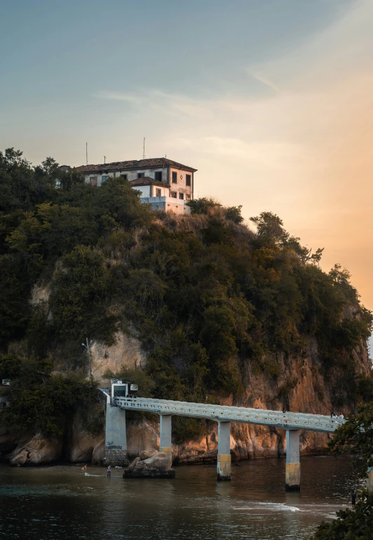 the small bridge crosses over to the village on a cliff