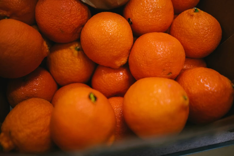 a pile of oranges piled on top of each other