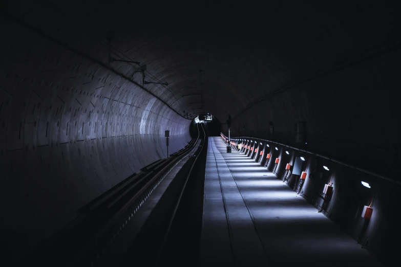 there are several subway stations, one with benches on each side