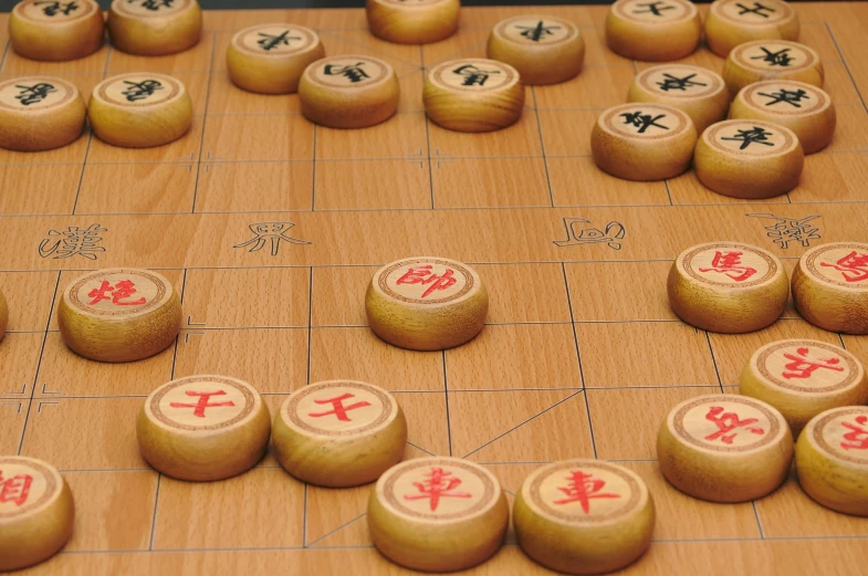 an oriental board game with chinese symbols on the boards