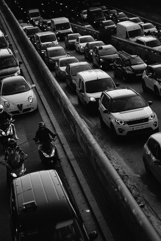 a very long line of cars traveling down a highway