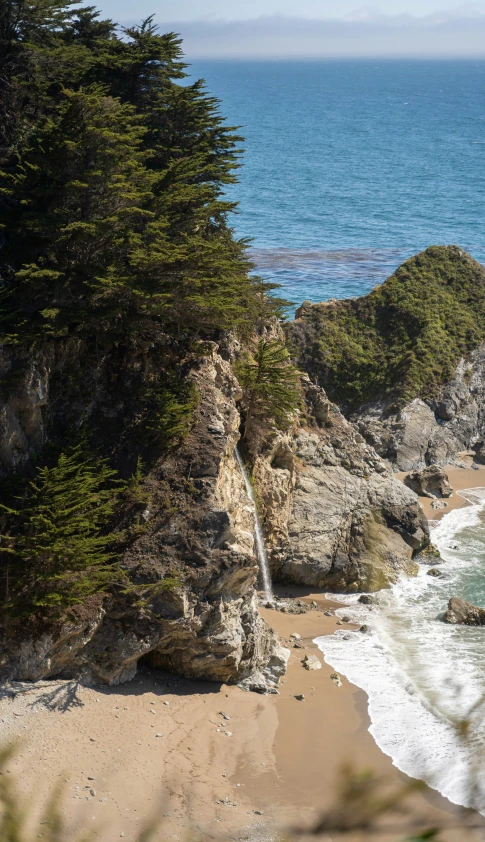 the water near the rocks are running through