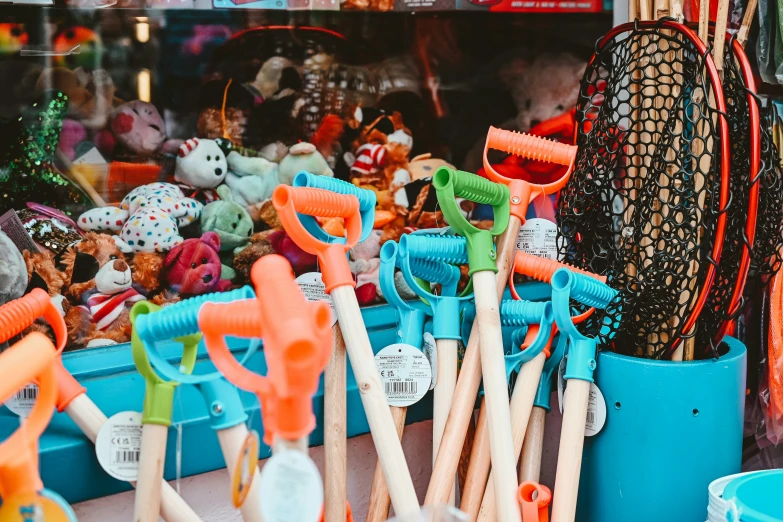 some knitting needles sitting on a blue barrel