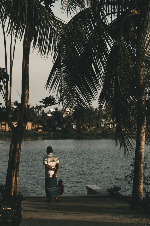 a person riding a skateboard through a park