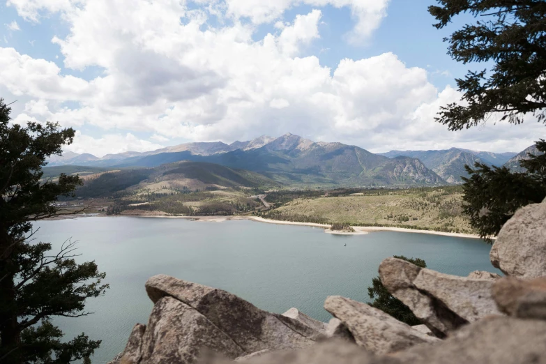 a mountain view from the top of a hill