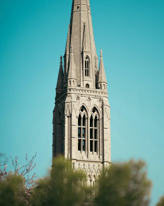 a close up view of an ancient church spire